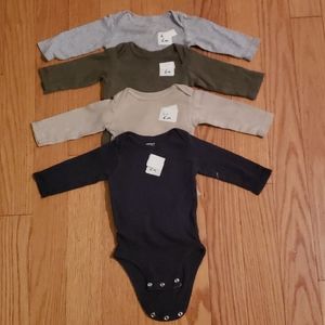 6 months Carter's bodysuits. Lot of 4.